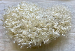 White Sheepskin Cushion with Pastel Colored Felt